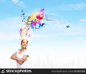 Creativity concept. Young smiling woman with colorful thoughts above head