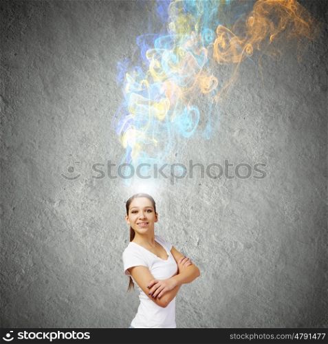 Creativity concept. Young smiling woman with colorful thoughts above head