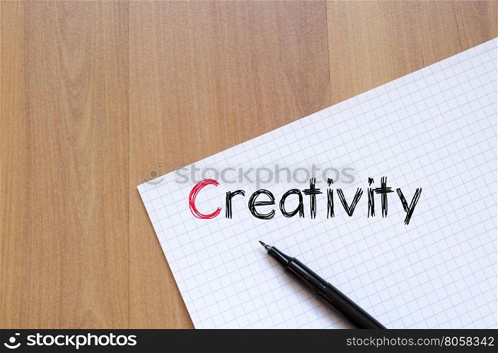Creativity text concept write on notebook