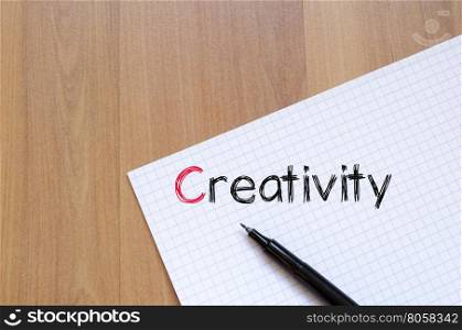Creativity text concept write on notebook