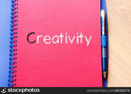 Creativity text concept write on notebook