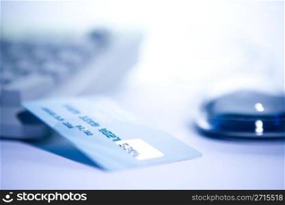 Credit card and computer. Online shopping.