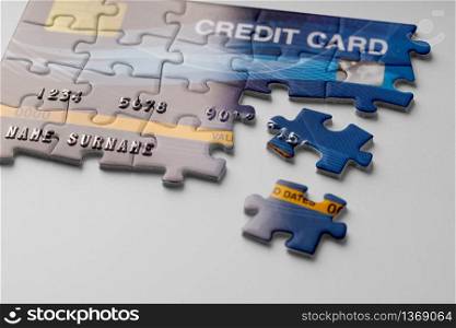 Credit card on jigsaw puzzle for Online shopping concept