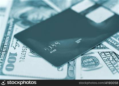 Credit card on the american dollars background
