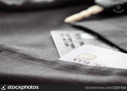 Credit cards in very shallow focus  with gray suit background as online shopping concept