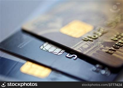 credit cards on a blue background, selective focus. closeup.