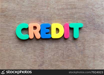 credit colorful word in the wooden background