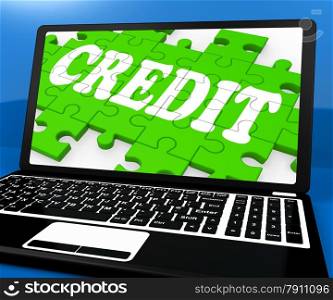 . Credit Puzzle On Notebook Shows Online Purchases And Digital Money