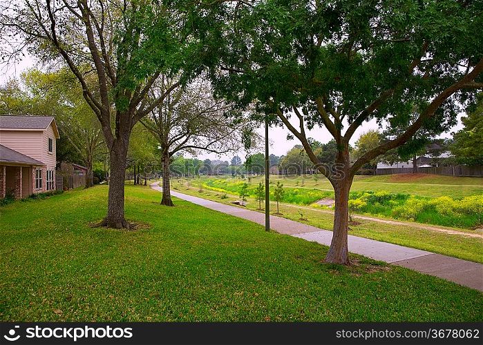 Creek park with track and green lawn grass in Texas outdoor