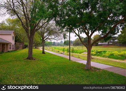 Creek park with track and green lawn grass in Texas outdoor