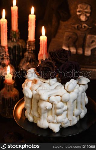 creepy cake (red velvet), decorated with meringue bones and drenched in blood. Great idea than treating guests