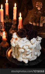 creepy cake (red velvet), decorated with meringue bones and drenched in blood. Great idea than treating guests