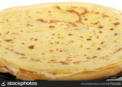 Crepe background. A detailed photo fried thin pancake.