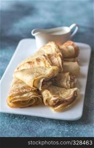 Crepes with blue cheese sauce