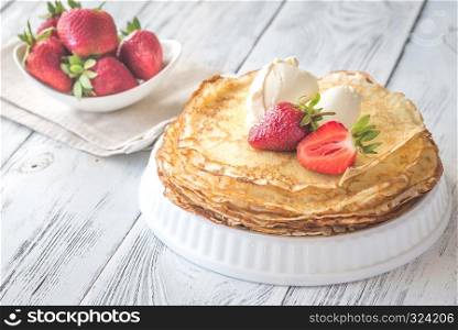 Crepes with cream cheese and fresh strawberries