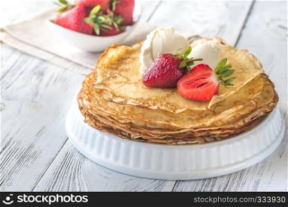 Crepes with cream cheese and fresh strawberries