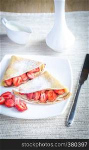 Crepes with fresh strawberries