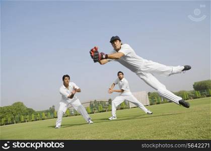 Cricketers fielding