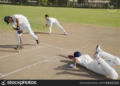 Cricketers in action