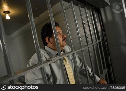 Criminal behind bars in jail