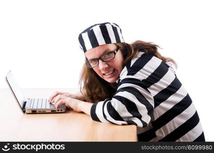 Criminal hacker with laptop on white