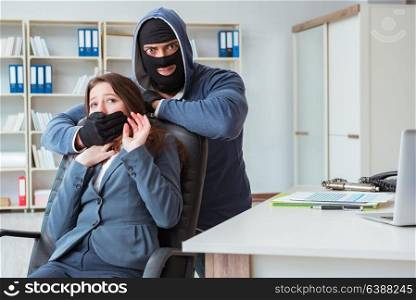 Criminal taking businesswoman as hostage in office