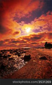 crimson sunset on a beach