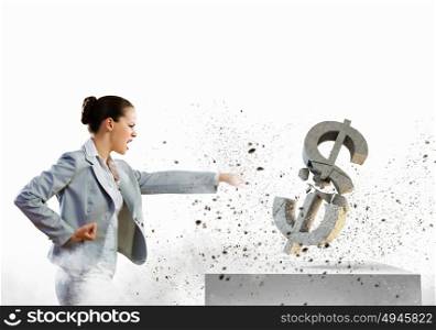 Crisis concept. Image of businesswoman breaking stone dollar symbol