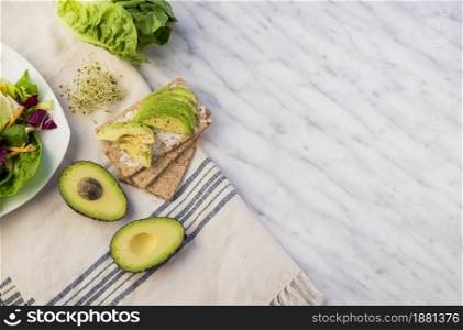 crisp bread with avocado table