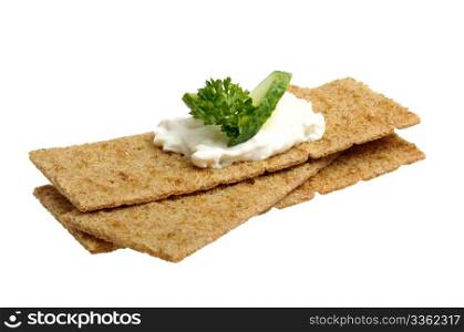 crispbread with curd cheese with cucumber and parsley