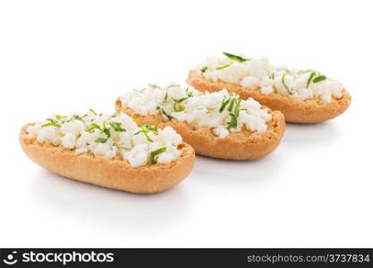 Crispbread with fromage isolated on white background.
