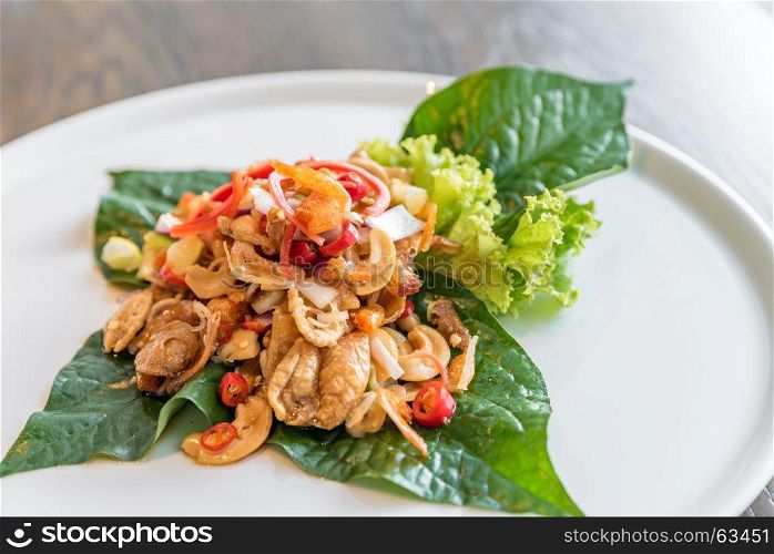 Crispy fish maw and dried shrimp in spicy salad