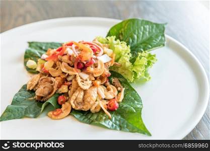 Crispy fish maw and dried shrimp in spicy salad. Crispy fish maw spicy salad