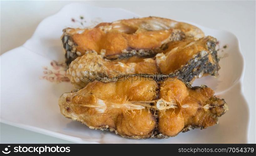 Crispy fish pieces. Crispy fish pieces, close up seafood dish
