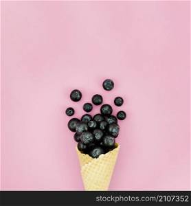 crispy ice cream cone with blueberry light surface