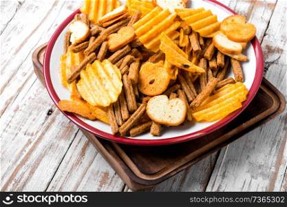 Crispy potato chips in bowl.Homemade potato chips. Crispy potato chips