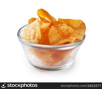 Crispy potato chips in glass bowl isolated on white background