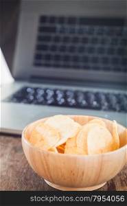 Crispy potato chips on wotk station, stock photo