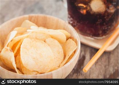 Crispy potato chips with iced cola, stock photo