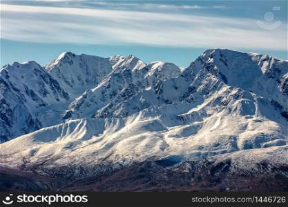 Crispy scenic view of snowy mountain peaks in Altai mountains, Russia. Fall 2019
