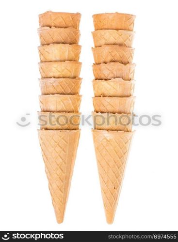 Crispy waffle cones for cream, ice cream. Studio Photo. Crispy waffle cones for cream, ice cream