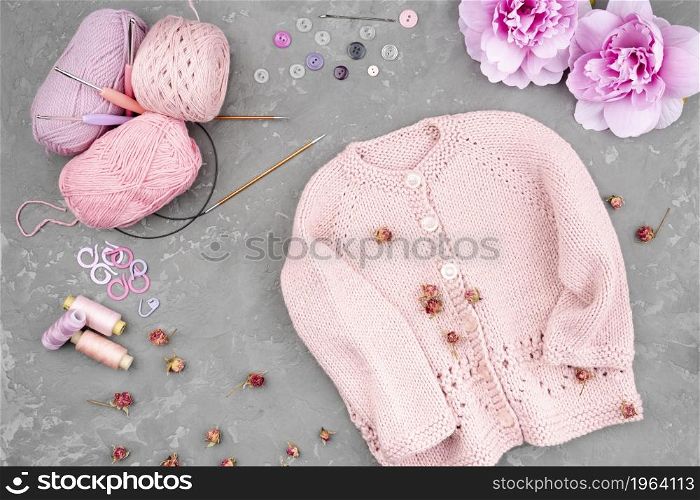 crocheted jacket slate background. High resolution photo. crocheted jacket slate background. High quality photo