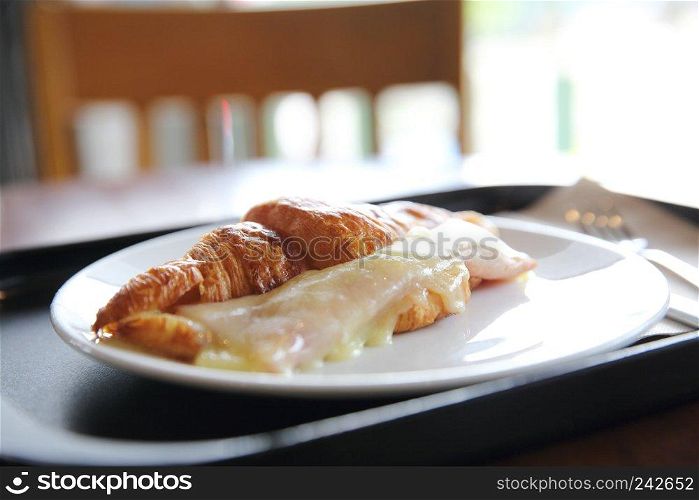 Croissant Ham cheese on wood