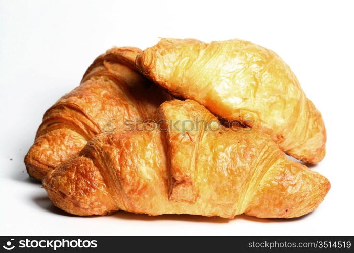 Croissant isolated on white background macro