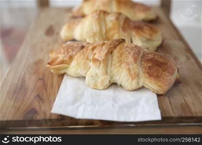 croissant on wood background
