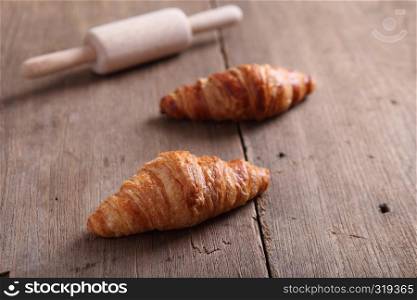 croissant on wood background