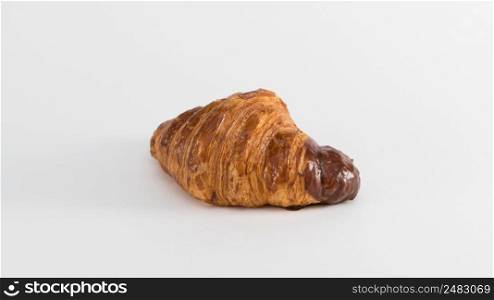 croissant with chocolate filling on a white background. french croissant on white