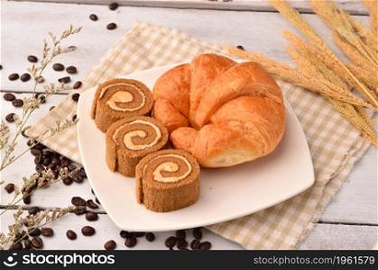 croissant with coffee bean