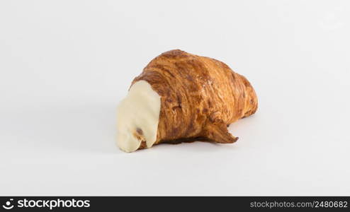 croissant with cream filling on a white background. french croissant on white