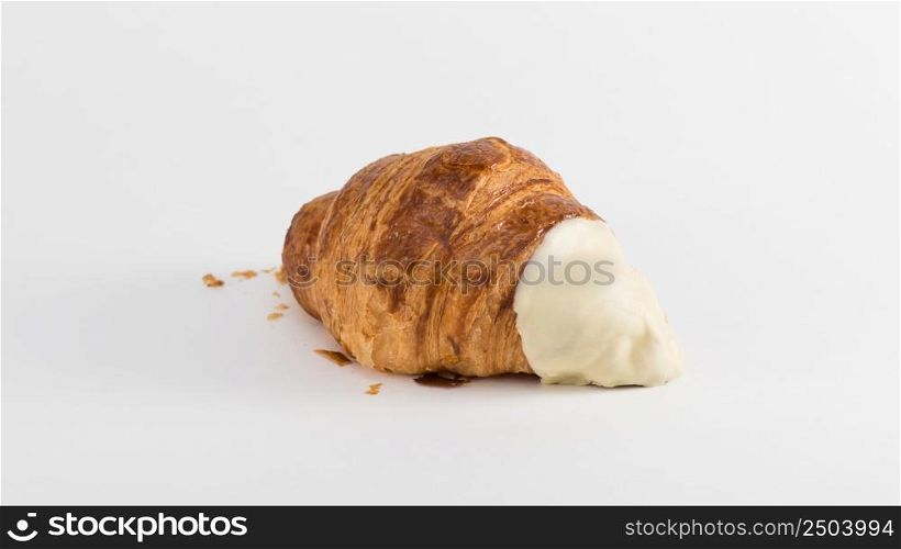 croissant with cream filling on a white background. french croissant on white